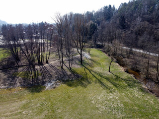 A brook  river stream  in Bavaria, aerial view photographed with a drone in winter