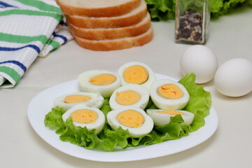 boiled eggs with lettuce leaf