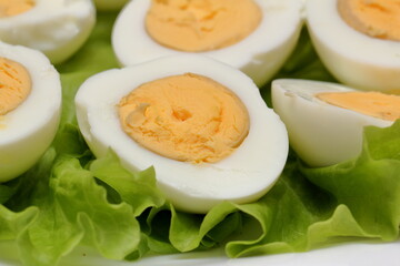 boiled eggs with lettuce leaf