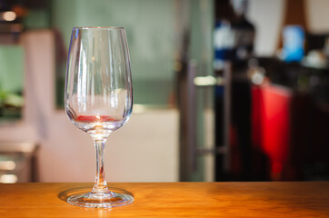 Empty wine glass in a bar