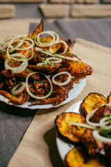 grilled chicken wings with vegetables