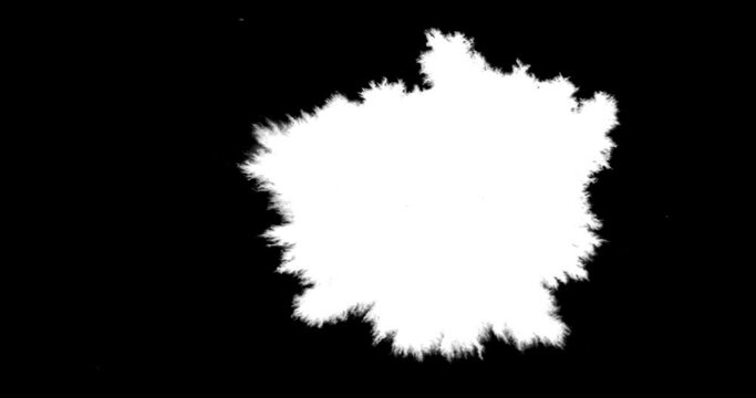 abstract paint brush stroke shape white ink splattering flowing and washing on chroma key green screen, ink splatter splash effect