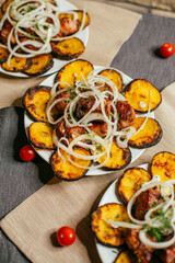 potatoes and grilled shish kebab on a plate