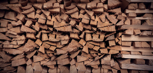 Wood pile background texture. Horizontal banner