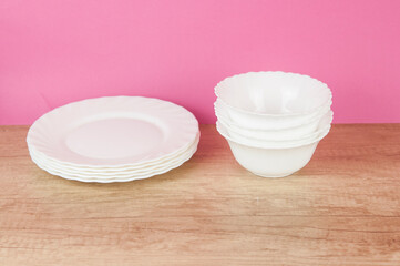 kitchenware set at wood table background