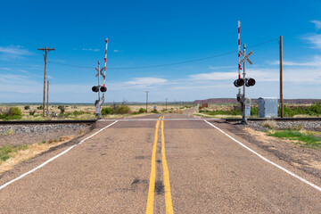 A railroad crossing in a rural area of the State of New Mexico, USA.,