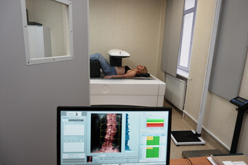 Investigation of the density of human bones using an osteodensitometry apparatus.