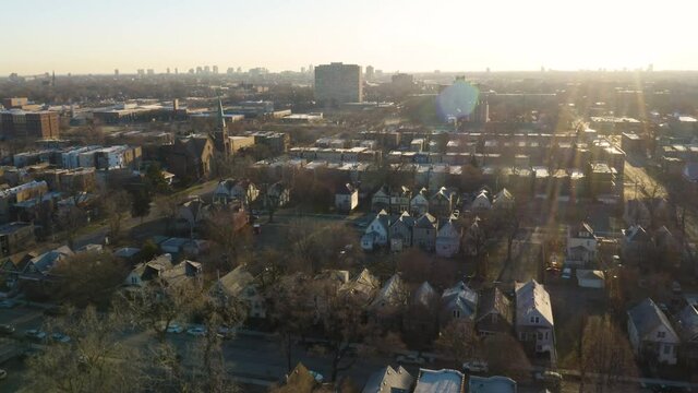 Aerial Flight Over Homes in Low Income Neighborhood at Sunrise