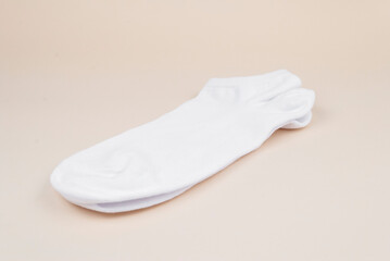 A pair of white sports socks