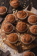 Homemade oat flakes muffins with peanut butter and chocolate.