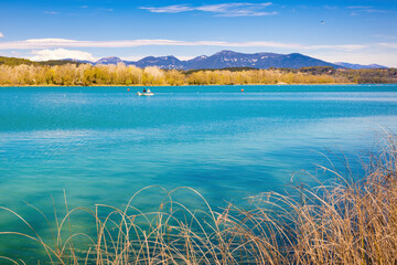 View of the great lake of Banyoles where all kinds of nautical activities are practiced, including rowing world championships. Banyoles, Catalonia, Spain