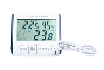 electronic clock thermometer hygrometer on white background isolation
