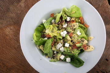 green salad with avocado and mozzarella