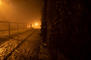 Prague streets in fogy night with lights