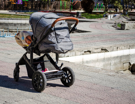 Baby stroller in the open air.