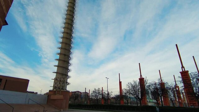 Turin,Italy.March 2020. The modern archdiocese: built in a former industrial site,it recovers elements such as a chimney to make the bell tower.At the base the group of bells and the decorated chimney