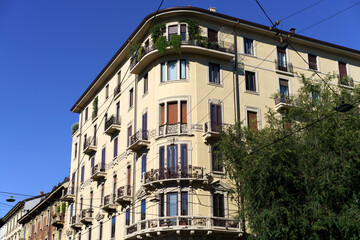 Fototapeta na wymiar Historic buildings along via San Michele del Carso in Milan
