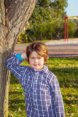 Charming boy waiting for friends