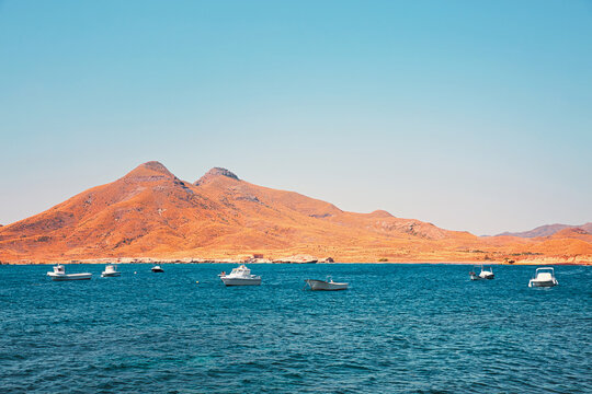 View of fishing boats on a summer day from the Isleta del Moro viewpoint, Cabo de Gata-N&radic;&ne;jar Natural Park, Almer&radic;&ne;a, Spain