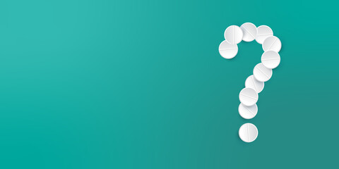 Pharmaceutical pills on a green background. Concept question mark