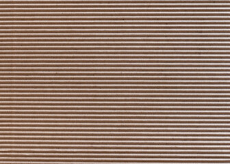 Obraz premium The texture of horizontally corrugated brown cardboard, background.