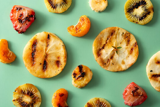 Grille fruit pattern on green background