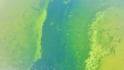 Aerial landscape of Shatsky National Park, Lake Svityaz, Top view, Ukraine, Volyn. Tourist attractions of Ukraine, internal tourism. Unusual divorces on the water surface of the lake