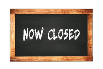 Obraz premium NOW CLOSED text written on wooden frame school blackboard.