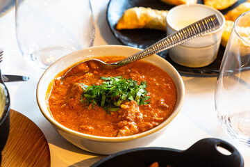 A traditional Georgian dish is chakhokhbili made of chicken in tomato sauce.