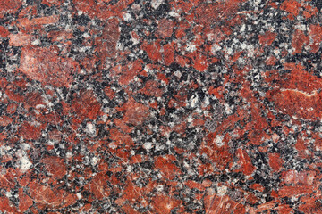 Artificial stone background burgundy black granite