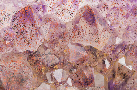 Extreme macro photograph of amethyst from the Purple Haze mine near Thunder Bay, Ontario, Canada. The red coloration is due to the presence of hematite inclusions.