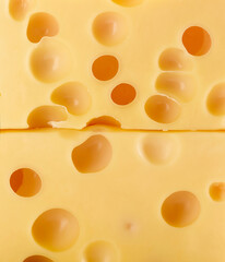 Texture of cheese with holes close up