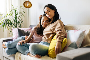 Single parenthood. Mother and daughter spending time together at home. - Powered by Adobe