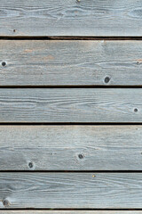 old wooden Board with a beautiful texture and knots as background