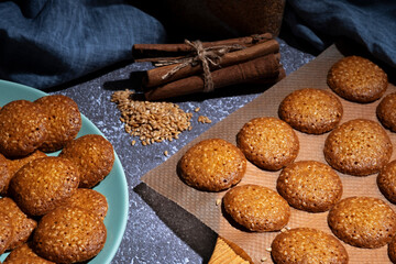 Sesame cookies with cinnamon are baked at home . Home-made healthy food