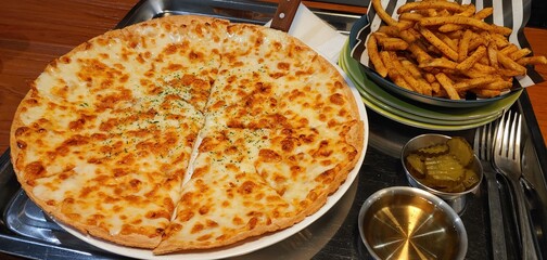 homemade Pizza and French Fries