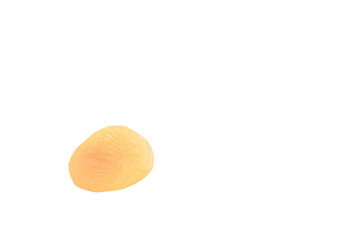 Closeup of a piece of ripe dried apricots on a white background