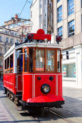 Fototapeta na wymiar Old retro red tram on Istiklal street in Istanbul, Turkey