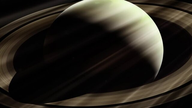Planet Saturn and Rays of Sun. Elements of this Video furnished by NASA. 4K Resolution.