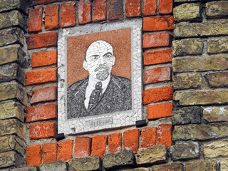 Portrait of a dictator with a mosaic on the tower