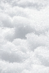 Fresh clean melting white snow and ice background texture. Winter background with frozen snowflakes and snow mounds. Snow lumps. Seasonal landscape details. Cold weather.