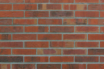Full frame close-up of a red brick wall