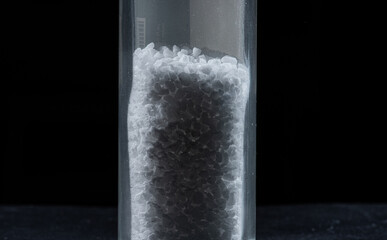 Sea salt in a narrow glass tube.