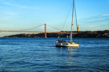 Sailing along the Tagus river in the afternoon