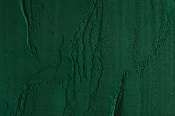 Background from Spirulina powder. Pattern. View from above