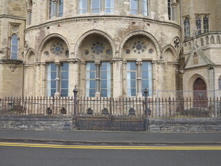 Aberystwyth Street View with Old College Facade and Iron Gate in Wales, UK