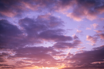 Fototapeta na wymiar Lilac pink sunset with clouds.