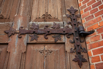 Medieval door of the church in Rokiskis, Lithuania