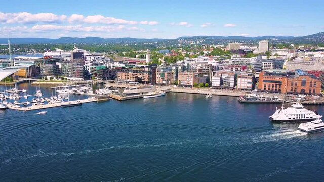 Tjuvholmen and Aker Brygge modern neighborhood aerial panoramic view in Oslo city, Norway