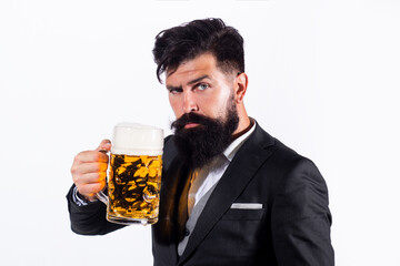 Man with beard drink beer. Guy with beer cup.